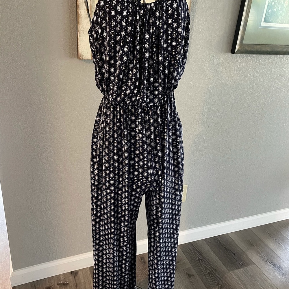 Silky jumpsuit with spaghetti straps.
